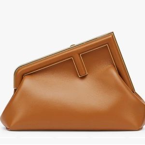 Brown clutch with gold strips